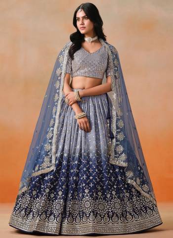 For A Designer Look,Grab These Party Wear Lehenga Choli in Fine Colored.These Lehenga And Blouse Are Fabricated On Georgette Pair With Dupatta Are Soft Net.Its Beautified With Pedding Color,Designer Jari,Sequance Embroidery Work.