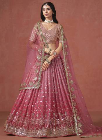 For A Designer Look,Grab These Party Wear Lehenga Choli in Fine Colored.These Lehenga And Blouse Are Fabricated On Georgette Pair With Dupatta Are Soft Net.Its Beautified With Pedding Color,Designer Jari,Sequance Embroidery Work.