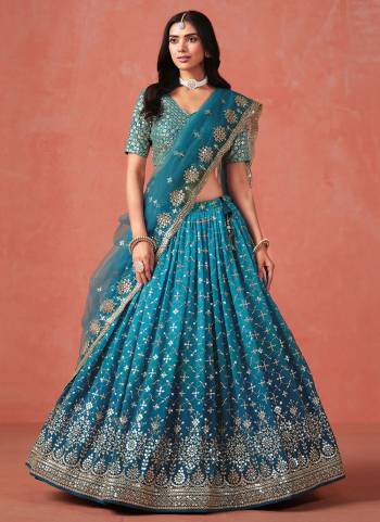 For A Designer Look,Grab These Party Wear Lehenga Choli in Fine Colored.These Lehenga And Blouse Are Fabricated On Georgette Pair With Dupatta Are Soft Net.Its Beautified With Pedding Color,Designer Jari,Sequance Embroidery Work.
