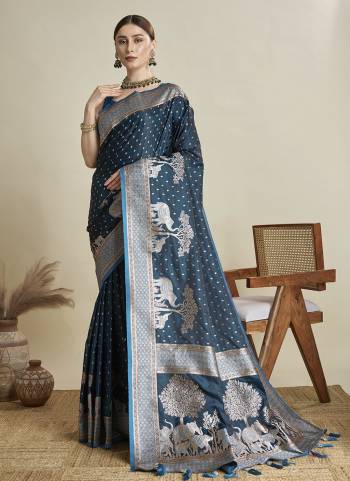 Looking This Party Wear Two Tone Saree Paired With Blouse.This Saree And Blouse Are Satin Silk Fabric With Two Tone Wevon Jari Designer. Buy This Pretty Saree Now.