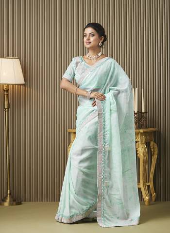 Garb These Fancy Party Wear Saree in Fine Colored.These Saree Are Organza And Blouse is Fabricated On Art Silk Pair.Its Beautified With Fancy Embroidery Work Disigner Saree.
