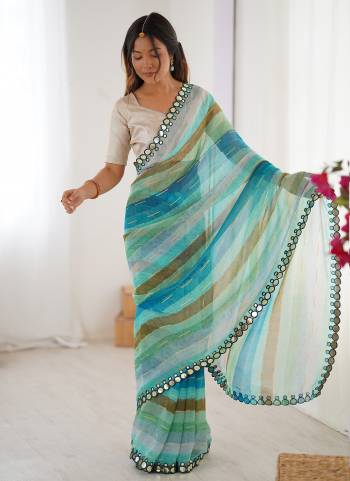 Attractive These Party Wear Saree in Fine Colored.These Saree Are Chiffon And Blouse is Jari Brocade Fabricated.Its Beautified With Designer Lariya Printed With Mirror Cut Work.