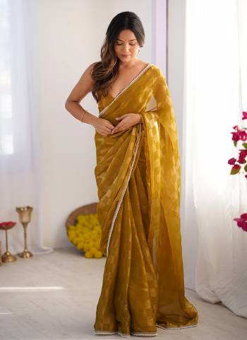 Looking These Party Wear Saree in Fine Colored.These Saree Are NC Chiffon Chex And Blouse is NC Chiffon Chex Fabricated.Its Beautified With Wevon Chex Designer With Moti Lace Border.