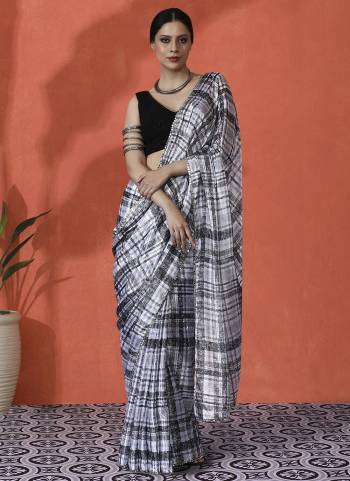 Looking These Party Wear Saree in Fine Colored.These Saree is Fabricated On Chinon Pair With Chinon Blouse.Its Beautified Designer Digital Printed.