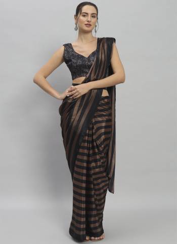 Attractive These Party Wear Ready To Wear Saree in Fine Colored.These Saree Are Satin And Blouse is Satin Fabricated.Its Beautified With Designer Striped Printed.