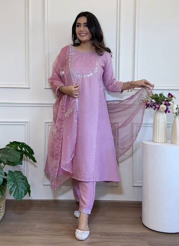 Garb These Suit in Fine Colored Pair With Bottom And Dupatta.These Top And Bottom Are Fabricated On Silk Blend Pair With Organza Dupatta.Its Beautified With Designer Embroidery Work.