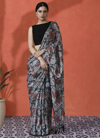Looking These Party Wear Saree in Fine Colored.These Saree is Fabricated On Chinon Pair With Chinon Blouse.Its Beautified Designer Digital Printed.