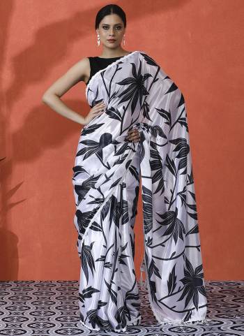 Looking These Party Wear Saree in Fine Colored.These Saree is Fabricated On Chinon Pair With Chinon Blouse.Its Beautified Designer Digital Printed.