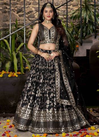 For A Designer Look,Grab These Lehenga Choli in Fine Colored.These Lehenga And Blouse Are Fabricated On Dola Silk Pair With Dupatta Are Organza.Its Beautified With Wevon Jacquard Designer,Jari, Sequance Embroidery Work.