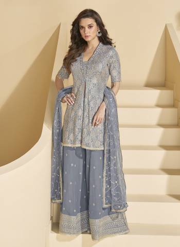 Attractive These Party Wear Free Size Stitched Plazzo Suit in Fine Colored Pair With Dupatta.These Top And Bottom Are Georgette And Dupatta Are Net And Pair With Santoon Inner.Its Beautified With Heavy Designer Embroidery Work.