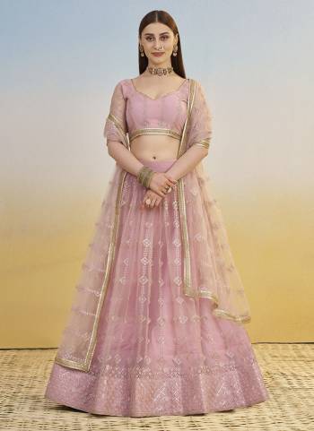 For A Different Look,Grab These Party Wear Designer Lehenga in All Over Pretty Colored Pair With Blouse And Dupatta.These Lehenga Choli And Dupatta is All Over Butterfly Net Base Fabric With Designer Cotton Thread,Sandwitch Sequance Embroidery Work.