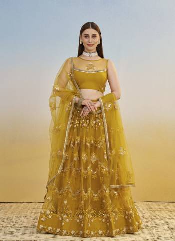 For A Different Look,Grab These Party Wear Designer Lehenga in All Over Pretty Colored Pair With Blouse And Dupatta.These Lehenga Choli And Dupatta is All Over Butterfly Net Base Fabric With Designer Cotton Thread,Sandwitch Sequance Embroidery Work.