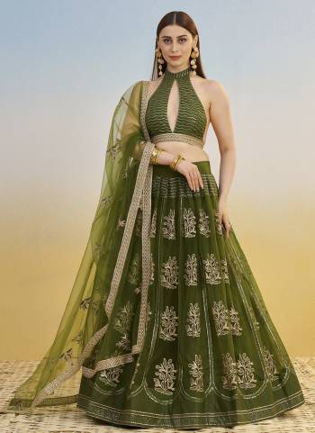 For A Different Look,Grab These Party Wear Designer Lehenga in All Over Pretty Colored Pair With Blouse And Dupatta.These Lehenga Choli And Dupatta is All Over Butterfly Net Base Fabric With Designer Cotton Thread,Sandwitch Sequance Embroidery Work.