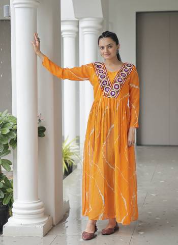 Garb These Beautiful Looking Readymade Long Kurti.These Kurti is Fabricated On Faux Georgette.Its Beautified With Laheriya Printed Designer,Kutchi Patch Work.
