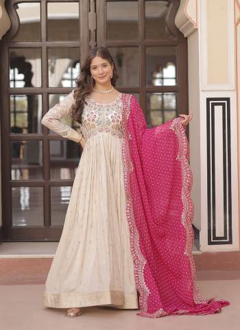 Garb These Beautiful Looking Party Wear Readymade Long Gown With Dupatta.These Gown Are Cosmos Jacquard And Dupatta is Fabricated On Georgette.Its Beautified With Wevon Jacquard Designer With Pearl Beads Embroidery Work Bandhani Printed Dupatta.