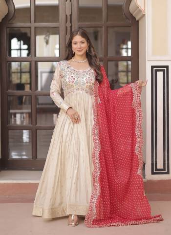 Garb These Beautiful Looking Party Wear Readymade Long Gown With Dupatta.These Gown Are Cosmos Jacquard And Dupatta is Fabricated On Georgette.Its Beautified With Wevon Jacquard Designer With Pearl Beads Embroidery Work Bandhani Printed Dupatta.
