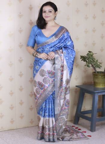 Looking These Party Wear Saree in Fine Colored.These Saree And Blouse is Fabricated On Tussar Silk.Its Beautified With Weaving Jari Border Designer With Madhubani Digital Printed.