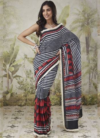 Garb These Party Wear Ready To Wear Saree in Fine Colored.These Saree Are Muslin And Blouse is Muslin Fabricated.Its Beautified With Designer Printed With Lace Border.