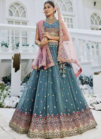 Attrective Looking This Party Wear Fine Color Fancy Heavy Designer Choli And Lahenga Fabriced On Tissue And Dupatta Net In Fabricated Beautified With Attrective Designer Heavy Sequance,Multy Thread Embroidery Work. Buy Now.