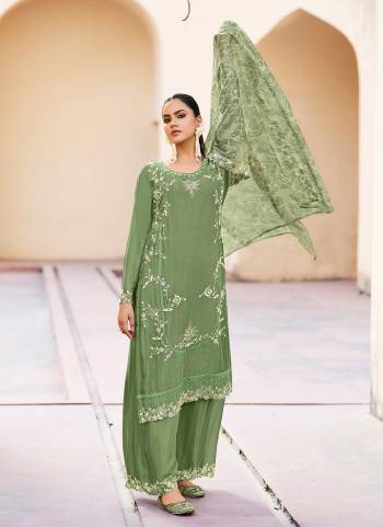 Attrective Looking These Plazzo Suit in Fine Colored Pair With Bottom And Dupatta.These Top And Bottom Are Fabricated On Chinon Pair With Organza Dupatta.Its Beautified With Designer Embroidery Work With Printed Dupatta.
