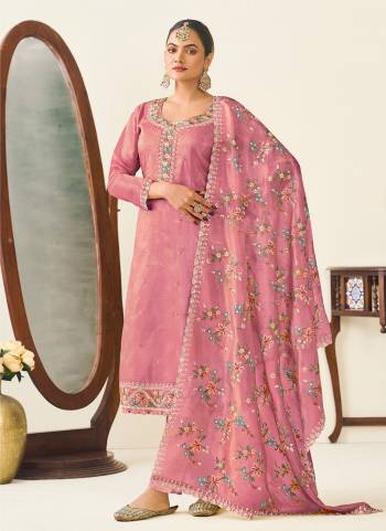 Attrective Looking These Salwar Suit in Fine Colored Pair With Bottom And Dupatta.These Top And Dupatta Are Fabricated On Gold Crush Silk Pair With Dull Santoon Bottom.Its Beautified With Designer Multy Thread Embroidery Work.