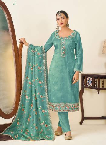 Attrective Looking These Salwar Suit in Fine Colored Pair With Bottom And Dupatta.These Top And Dupatta Are Fabricated On Gold Crush Silk Pair With Dull Santoon Bottom.Its Beautified With Designer Multy Thread Embroidery Work.