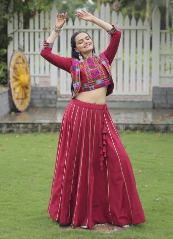 Looking These Beautiful Looking Navratri Wear Free Size Stitched Lahenga With Koti Style Choli.These Lahenga Are Roman Silk And Blouse is Fabricated On Ramon Silk.Its Beautified With Designer Kutchi Gamthi Embroidery Work.