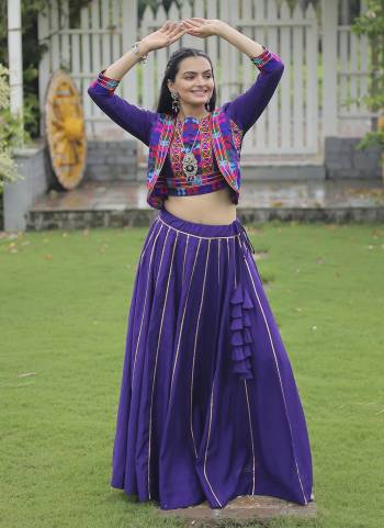 Looking These Beautiful Looking Navratri Wear Free Size Stitched Lahenga With Koti Style Choli.These Lahenga Are Roman Silk And Blouse is Fabricated On Ramon Silk.Its Beautified With Designer Kutchi Gamthi Embroidery Work.