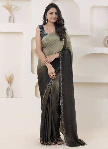 Looking These Party Wear Ready To Wear Saree in Fine Colored.These Saree Are Satin And Blouse is Satin Fabricated.Its Beautified With Pedding Color Designer With Swarovski Border And Printed Blouse.