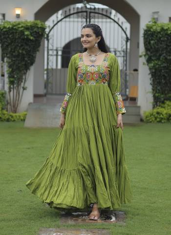 Garb These Beautiful Looking Navratri Readymade Long Gown.These Gown is Fabricated On Rayon.Its Beautified With Designer Katchi Gamti Embroidery Work.