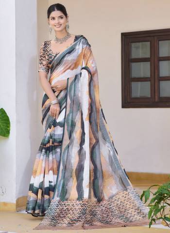 Garb These Fastive Saree in Fine Colored.These Saree Are Linen Cotton And Blouse is Fabricated On Linen Cotton Pair.Its Beautified With Wevon Jari Border With Designer Digital Printed.