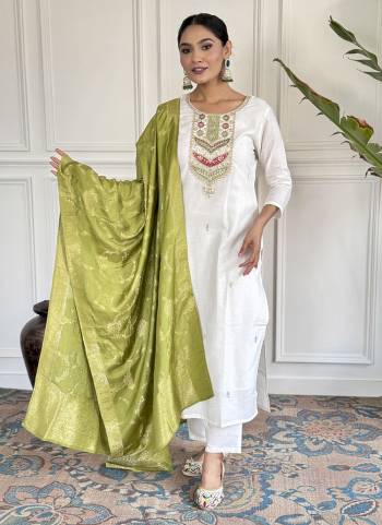 Garb These Suit in Fine Colored Pair With Bottom And Dupatta.These Top And Bottom Are Fabricated On Viscose Blend Pair With Jacquard Silk Dupatta.Its Beautified With Designer Embroidery Work.