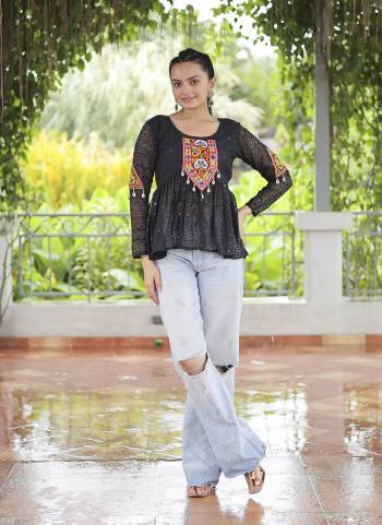 Looking These Beautiful Navratri  Readymade Short Kurti.These Kurti is Fabricated On Georgette.Its Beautified With Designer Schiffli Embroidery With Kutchi Gamthi Patch Work.