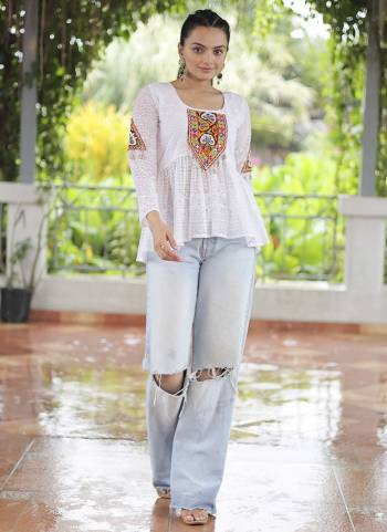 Looking These Beautiful Navratri  Readymade Short Kurti.These Kurti is Fabricated On Georgette.Its Beautified With Designer Schiffli Embroidery With Kutchi Gamthi Patch Work.