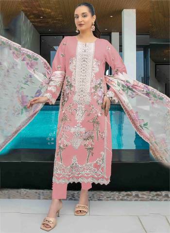 Looking These Designer Suit in Fine Colored Pair With Bottom And Dupatta.These Top Are Cotton And Dupatta Are Fabricated On Organza Pair With Cotton Bottom.Its Beautified With Printed Designer With Embroidery Work.