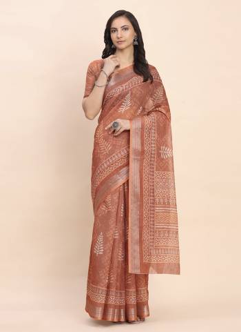 Looking These Fastive And Party Wear Saree in Fine Colored.These Saree And Blouse is Fabricated On Linen Cotton.Its Beautified With Woven Jari Border Designer With Printed.