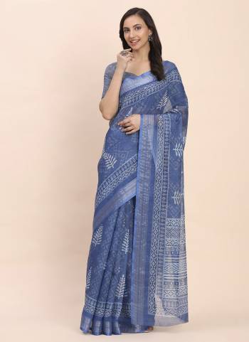 Looking These Fastive And Party Wear Saree in Fine Colored.These Saree And Blouse is Fabricated On Linen Cotton.Its Beautified With Woven Jari Border Designer With Printed.