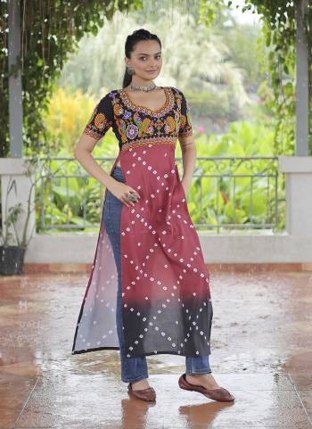 Looking These Beautiful Navratri  Readymade Kurti.These Kurti is Fabricated On Rayon.Its Beautified With Designer Printed With Kutchi Gamthi Work.