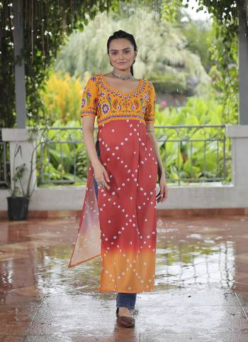 Looking These Beautiful Navratri  Readymade Kurti.These Kurti is Fabricated On Rayon.Its Beautified With Designer Printed With Kutchi Gamthi Work.