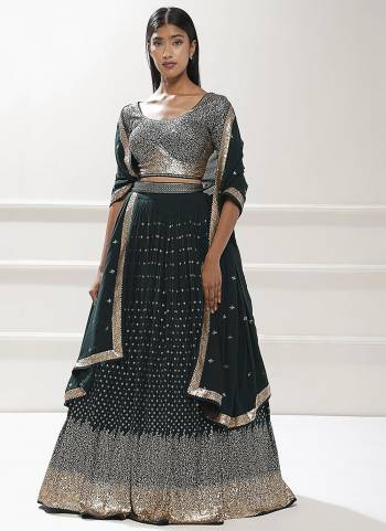 For A Designer Look,Grab These Lehenga Choli in Fine Colored.These Lehenga And Blouse Are Fabricated On Georgette Pair With Dupatta Are Georgette.Its Beautified With Designer Sequance,Jari Embroidery Work.