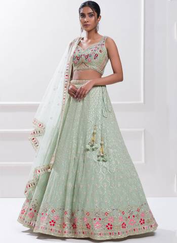 For A Designer Look,Grab These Lehenga Choli in Fine Colored.These Lehenga And Blouse Are Fabricated On Georgette Pair With Dupatta Are Georgette.Its Beautified With Designer Sequance,Jari Embroidery Work.
