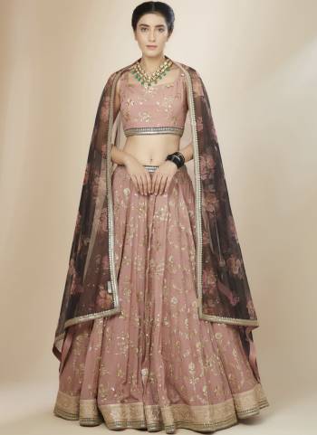 For A Designer Look,Grab These Lehenga Choli in Fine Colored.These Lehenga And Blouse Are Fabricated On Georgette Pair With Dupatta Are Georgette.Its Beautified With Designer Sequance,Jari Embroidery Work.