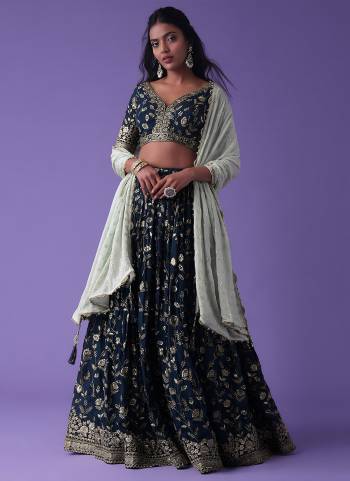 For A Designer Look,Grab These Lehenga Choli in Fine Colored.These Lehenga And Blouse Are Fabricated On Georgette Pair With Dupatta Are Georgette.Its Beautified With Designer Sequance,Jari Embroidery Work.