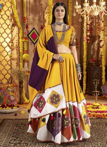 Attrective These Navratri Special Lehenga Choli in Fine Colored.These Lehenga Are Viscose Cotton And Blouse Are Viscose Cotton And Dupatta Are Fabricated On Viscose Cotton.Its Beautified With Designer Multy Thread,Mirror Embroidery Work.