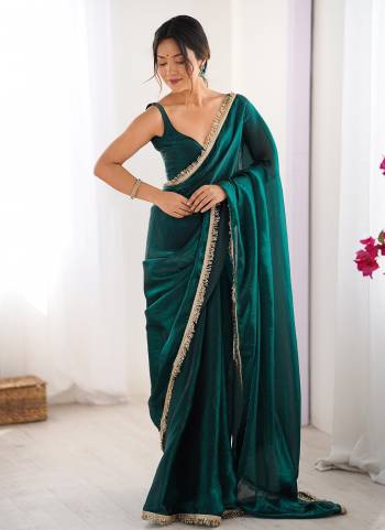 Looking These Party Wear Saree in Fine Colored.These Saree Are Fendy Satin Two Tone And Blouse is Faendy Satin Two Tone Fabricated.Its Beautified With Two Tone Solid With Sequance Lace Border.