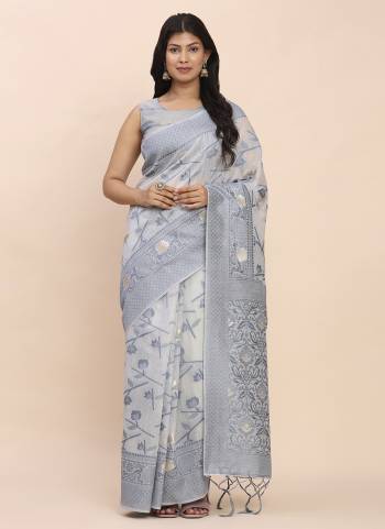 Looking These Fastive And Party Wear Saree in Fine Colored.These Saree And Blouse is Fabricated On Linen Cotton.Its Beautified With Woven Jacquard Designer.