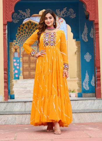 Garb These Beautiful Looking Readymade Long Gown.These Gown is Fabricated On Faux Georgette.Its Beautified With Lahariya Printed Designer, Kutchi Patch Work.