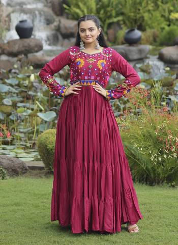 Garb These Beautiful Navratri Wear Readymade Long Gown.These Gown is Fabricated On Rayon.Its Beautified With Designer Kutchi Gamthi Embroidery Work.