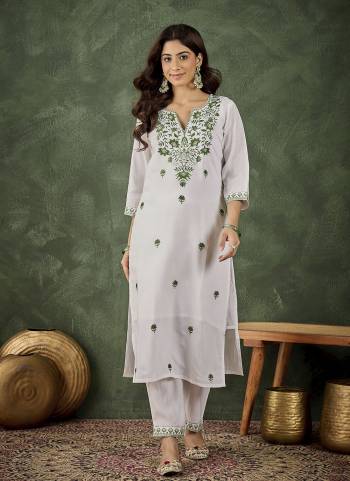 Attrective These Beautiful Looking Readymade Kurti With Bottom.These Kurti And Bottom Are Fabricated On Roman Silk Blend.Its Beautified With Designer Embroidery Work.