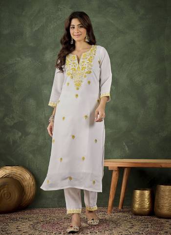 Attrective These Beautiful Looking Readymade Kurti With Bottom.These Kurti And Bottom Are Fabricated On Roman Silk Blend.Its Beautified With Designer Embroidery Work.